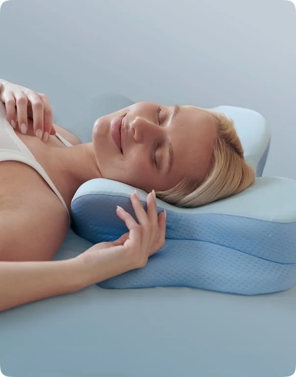Seller illustration showing the shape of Ergo Pillow in a resting position